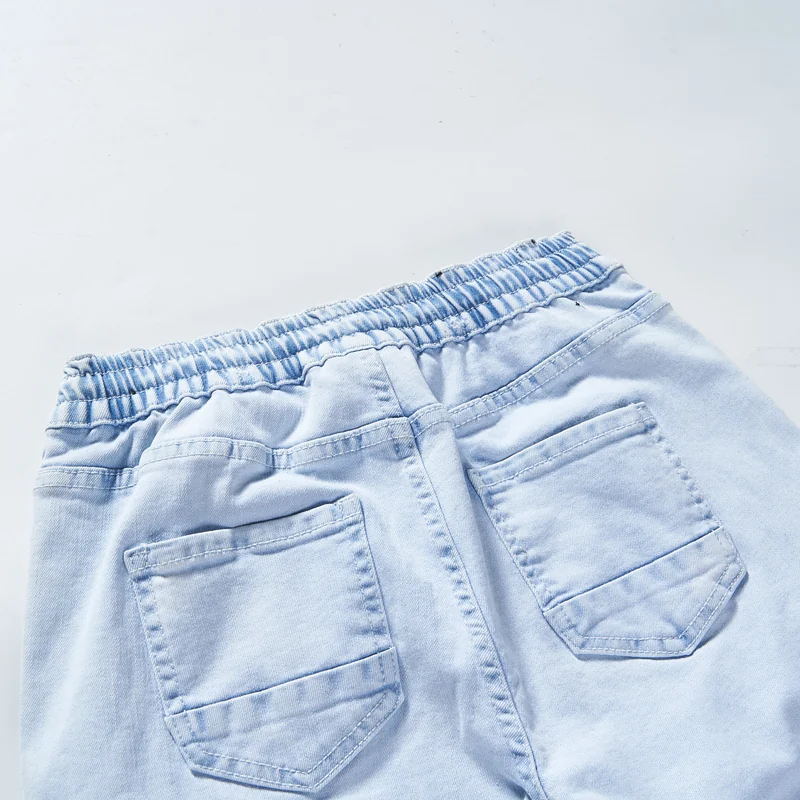 kids-light-wash-camo-patch-denim-cargo-joggers-2c010-back-pocket-detail