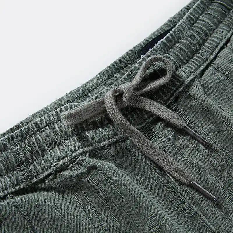Drawcord and waistband construction detail on cargo pants style 4164568
