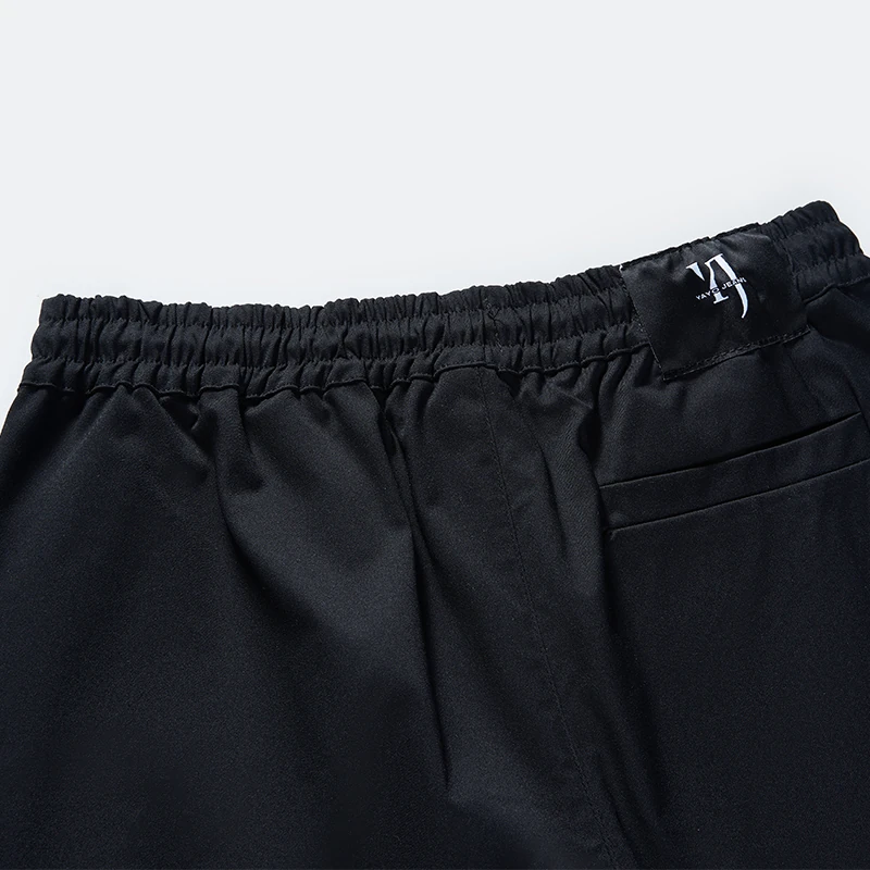 Back elastic waistband and pocket detail on cargo joggers style 76032