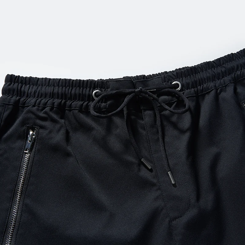Elastic drawstring waist and angled zip pocket detail, style 76032