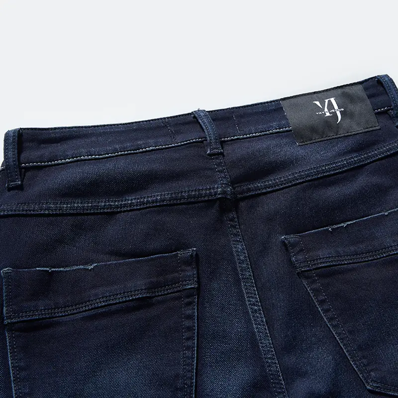 Back waistband, patch pocket and label detail on jeans style 68010