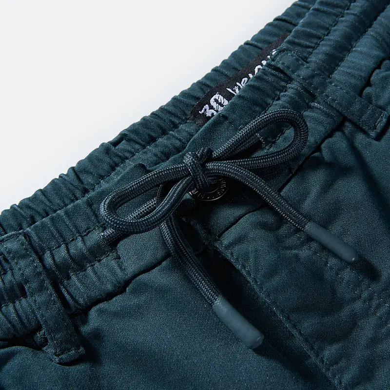 Black drawcord and waistband construction detail on joggers style 4264553