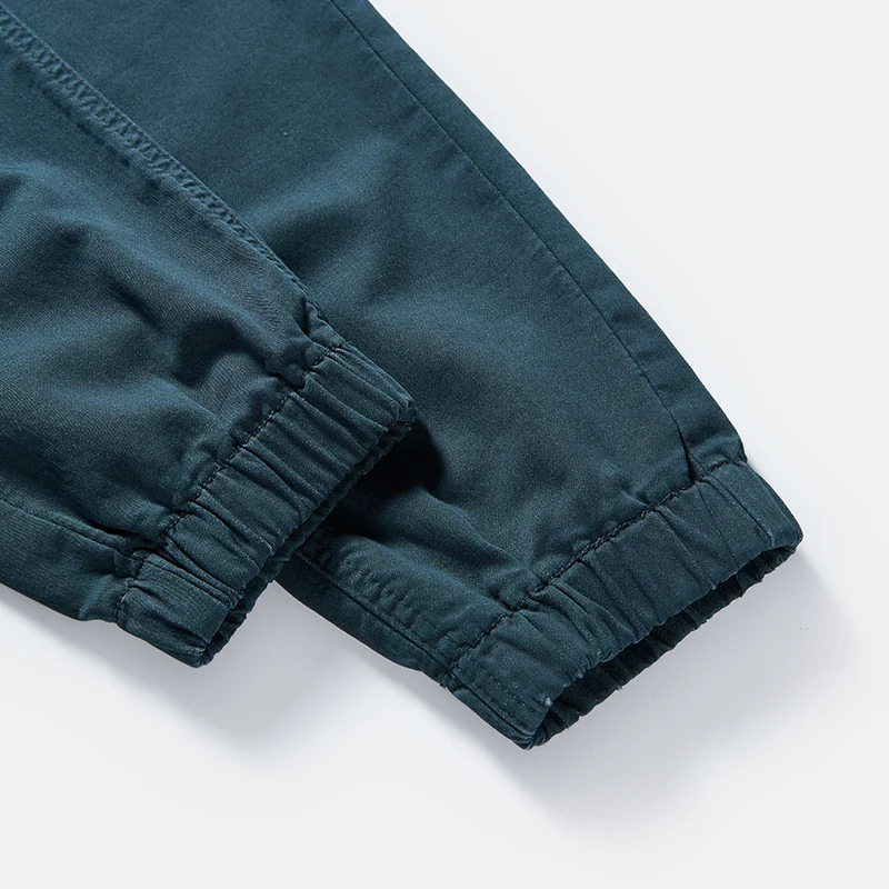 Elasticated ankle cuff and seam detail on teal joggers style 4264553