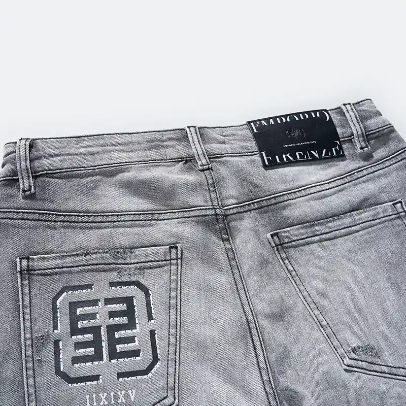 Back waistband and embossed pocket artwork on grey jeans style DJFW2508M