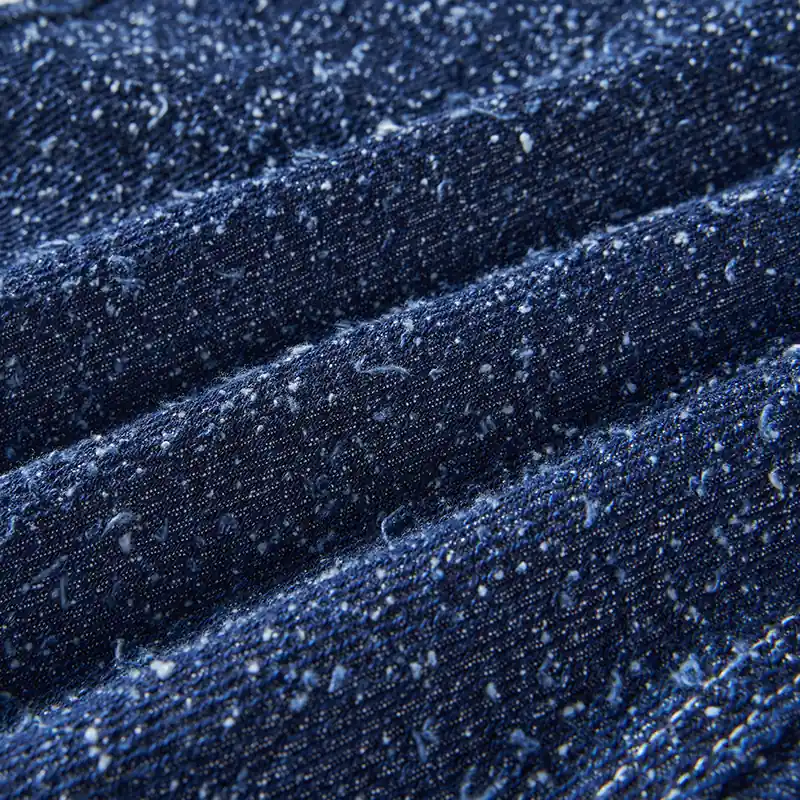 Deep indigo fleck jacquard denim texture detail for style 4264551
