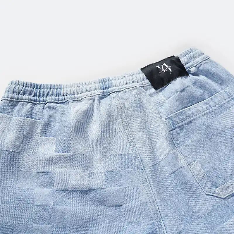 Back waist and patch pocket detail on denim pants style 68071