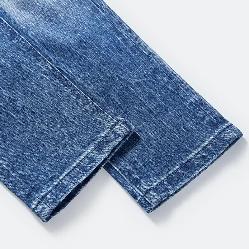 Men's light blue ripped regular-waist slim jeans, hem and wash detail, style DJSS2611M