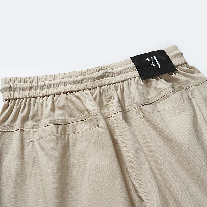 Back elastic waistband, patch pocket and label detail, style 8244003
