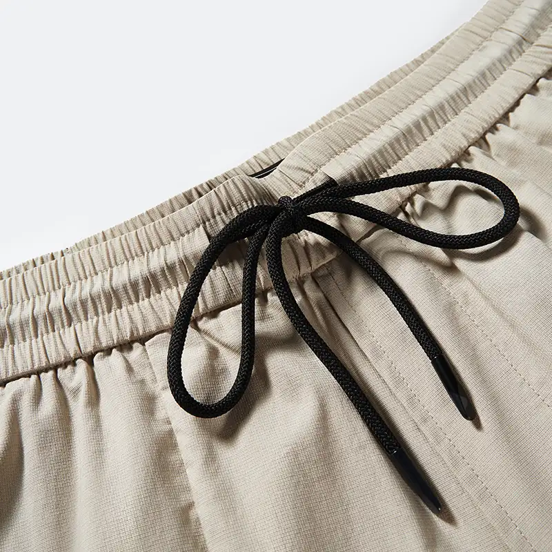 Black contrast drawcord and waist seam detail, style 8244003