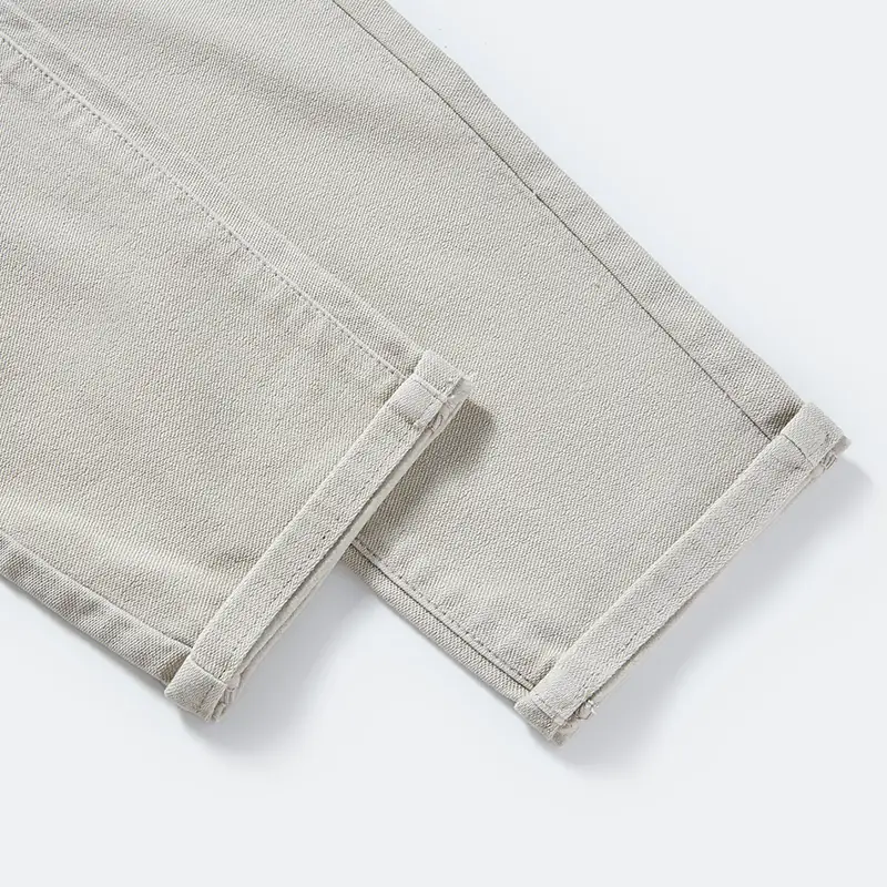 Turn-up hem and side seam detail on tapered pants style 4264552