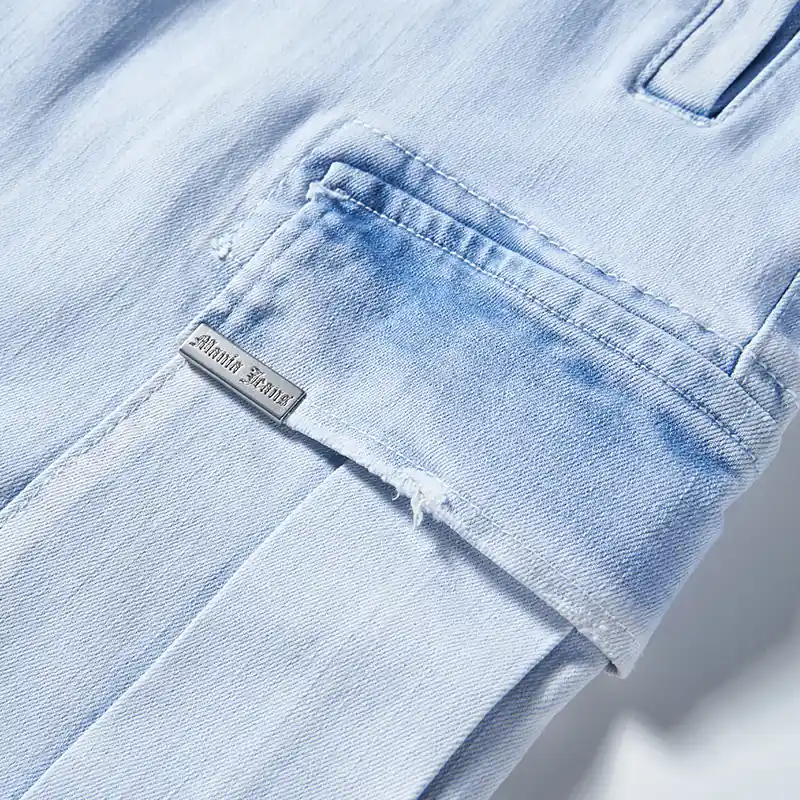 Flap cargo pocket and metal trim detail on jeans style 4E813