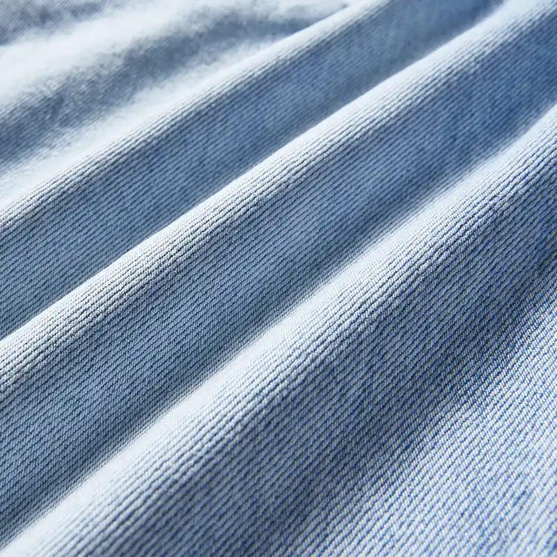 Light blue washed denim texture detail for style 4D715