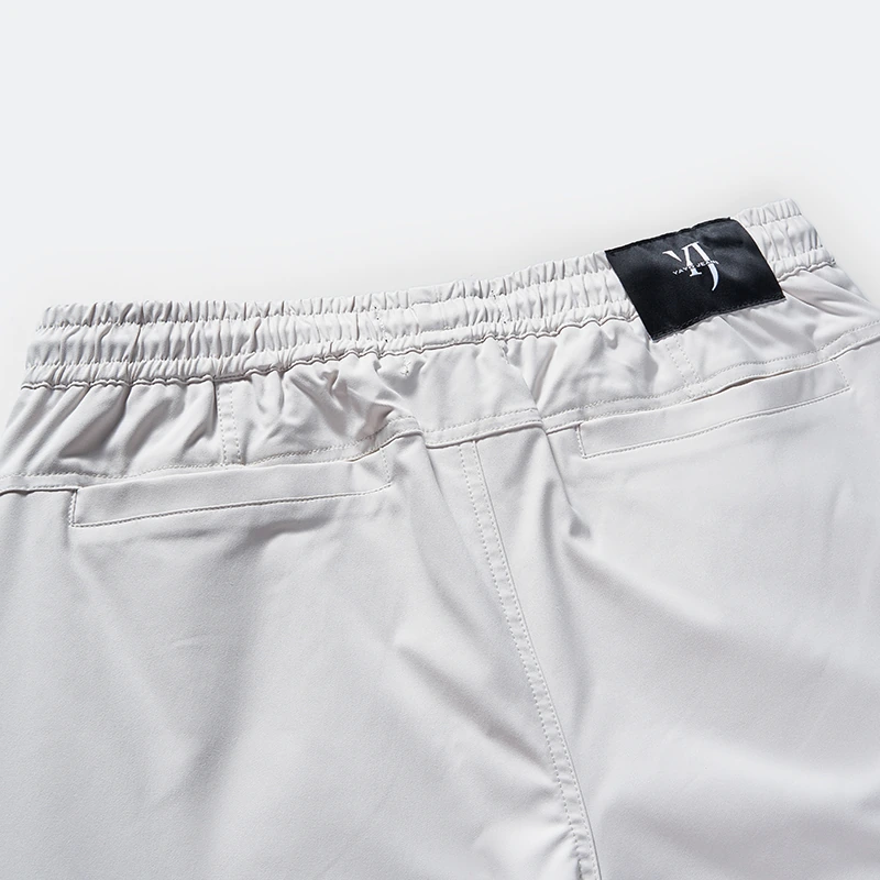 Back waistband and pocket detail on men's cargo jogger style 1-2115