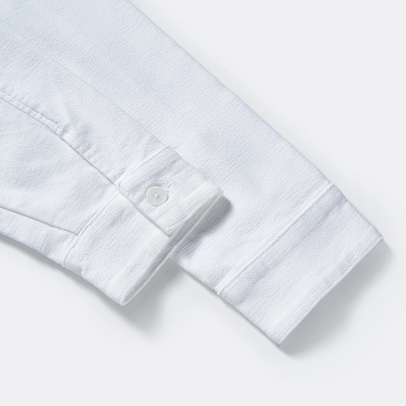 Button cuff and sleeve seam detail on white overshirt style 4141027
