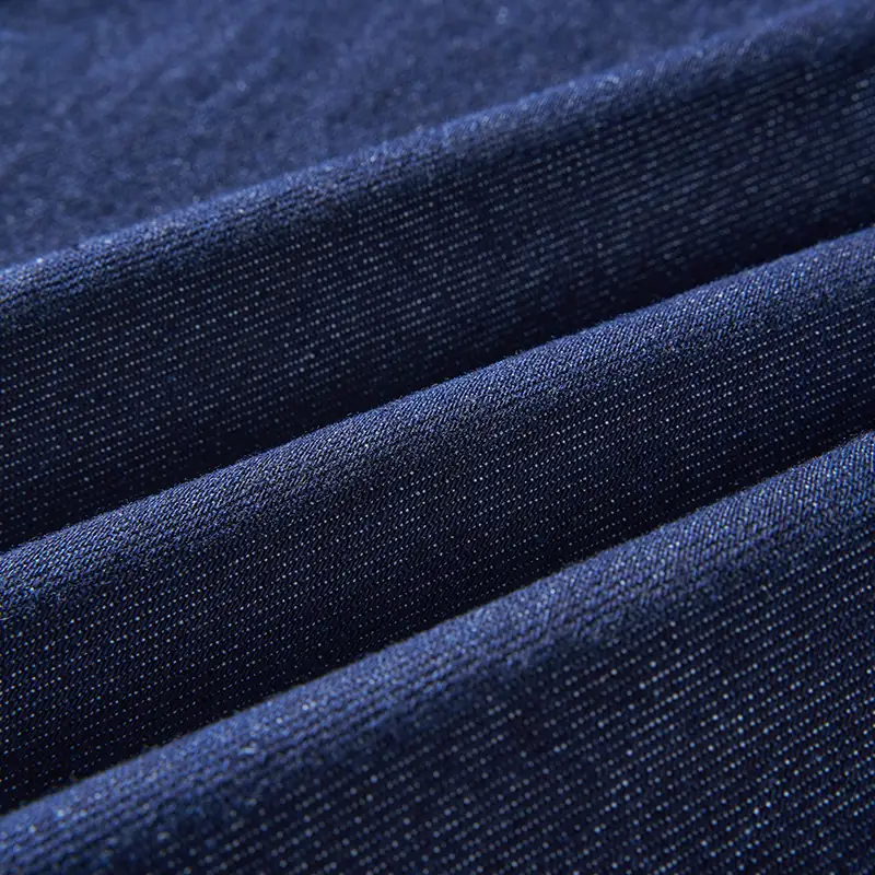 Dark indigo denim texture detail for women's jeans style 57065