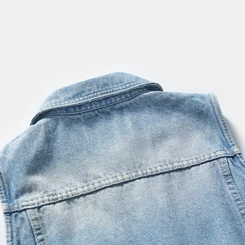 Back yoke and wash detail of women's denim romper style 56162