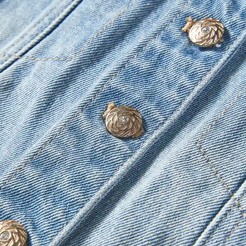 Metal button and denim construction detail on women's romper style 56162