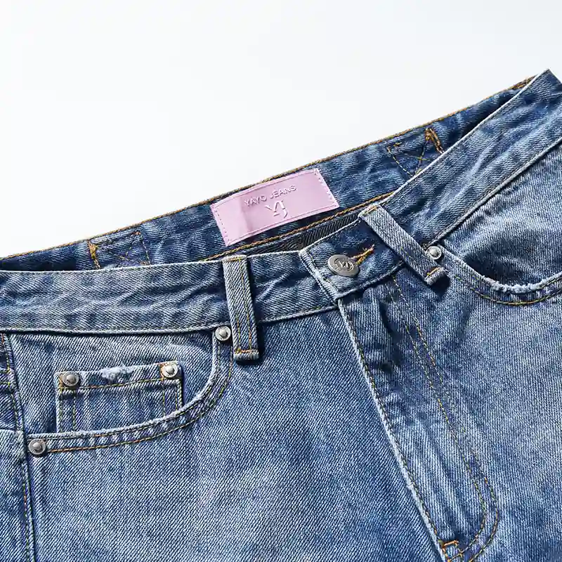 Waistband, coin pocket and front wash detail on jeans style 58006